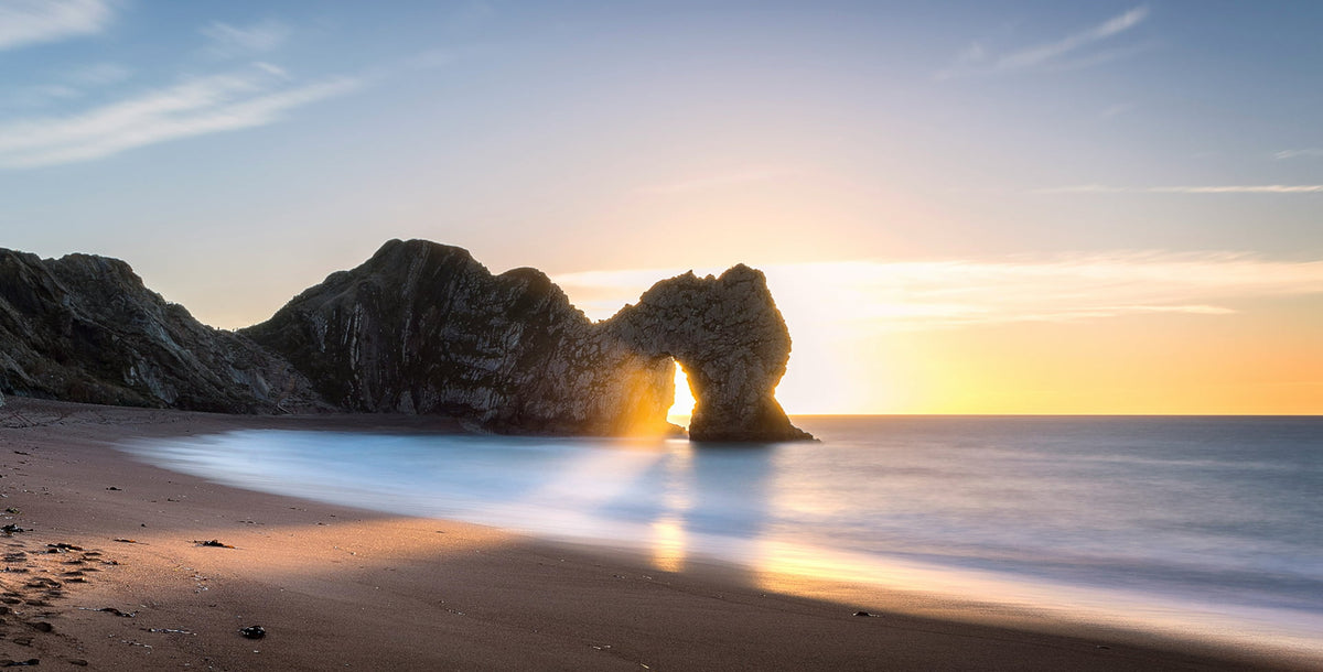 Durdle door with a morning sunrise - DONMARIE jewellery