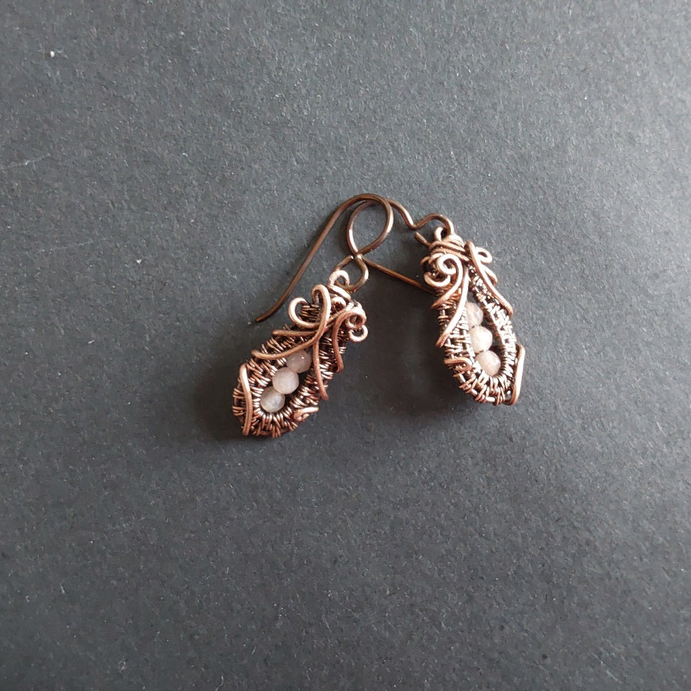 Faceted Peach Moonstone 'Ballet Shoe' style earrings with hypoallergenic ear wires. The wire weave component of each earring is approximately 1/2 an inch (2cm) in length plus ear wire length of 2 cm.