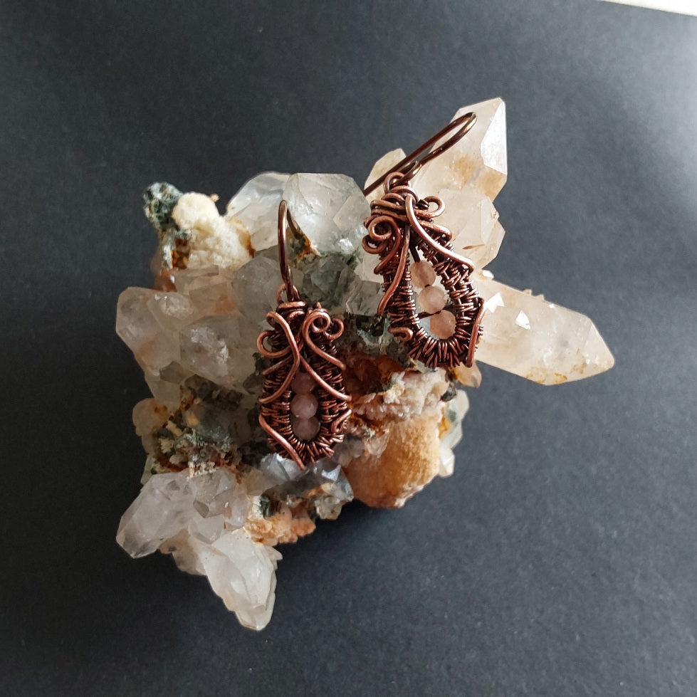 Faceted Peach Moonstone 'Ballet Shoe' style earrings with hypoallergenic ear wires. The wire weave component of each earring is approximately 1/2 an inch (2cm) in length plus ear wire length of 2 cm.