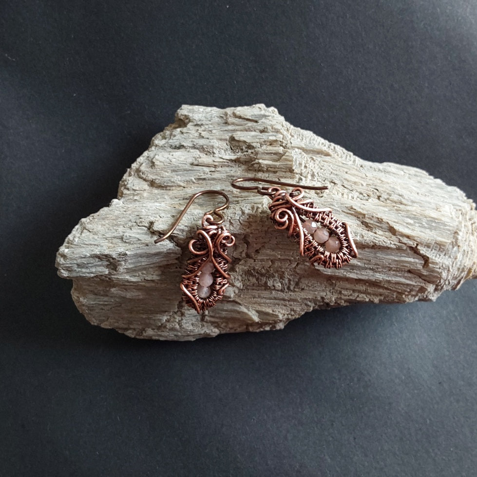 Faceted Peach Moonstone 'Ballet Shoe' style earrings with hypoallergenic ear wires. The wire weave component of each earring is approximately 1/2 an inch (2cm) in length plus ear wire length of 2 cm.