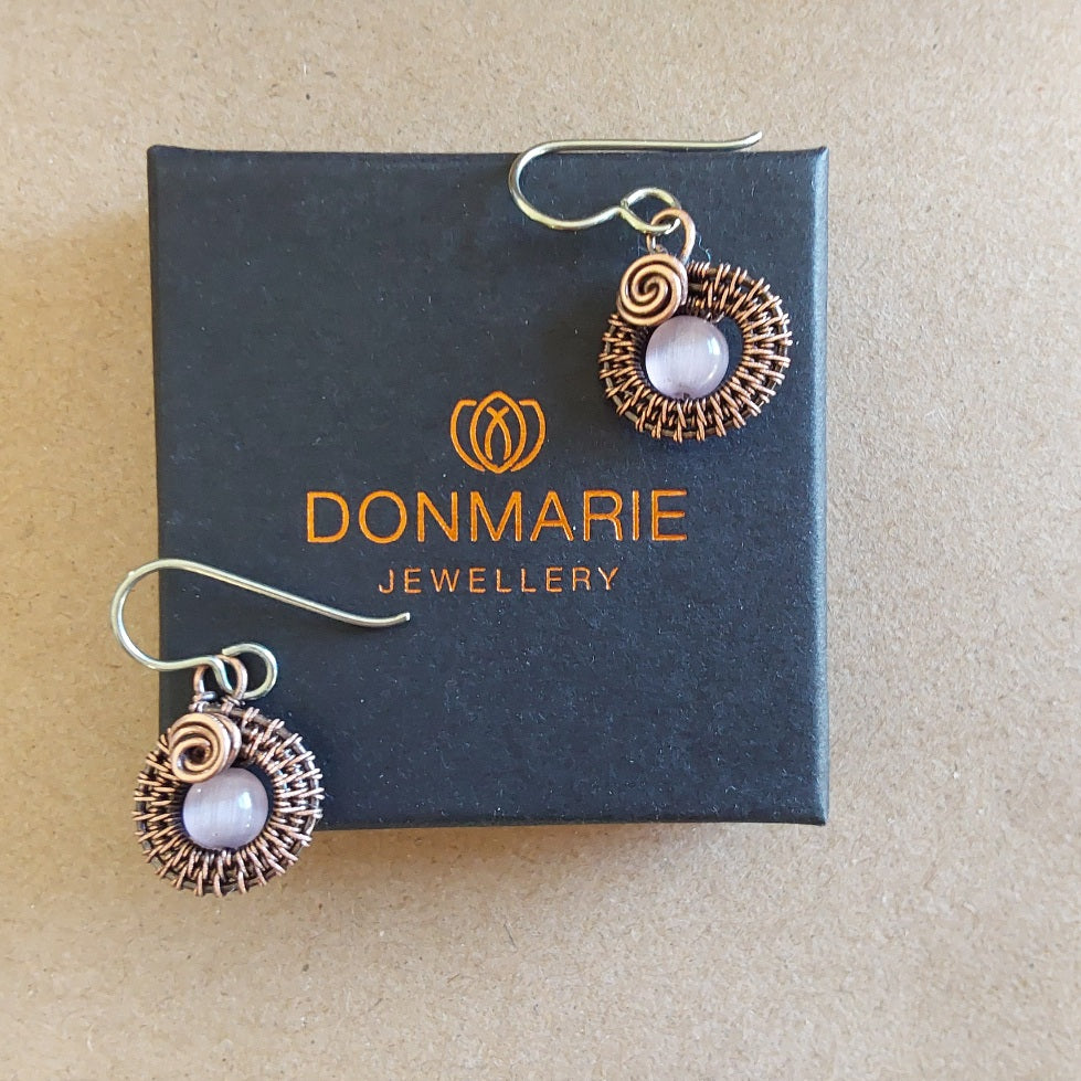 Mauve Cats Eye gemstone bead, copper wire weave non-tarnishing earrings with hypoallergenic ear wires. Earrings are 1/2 inch (1.5 cm) plus ear wire length of 2 cm.