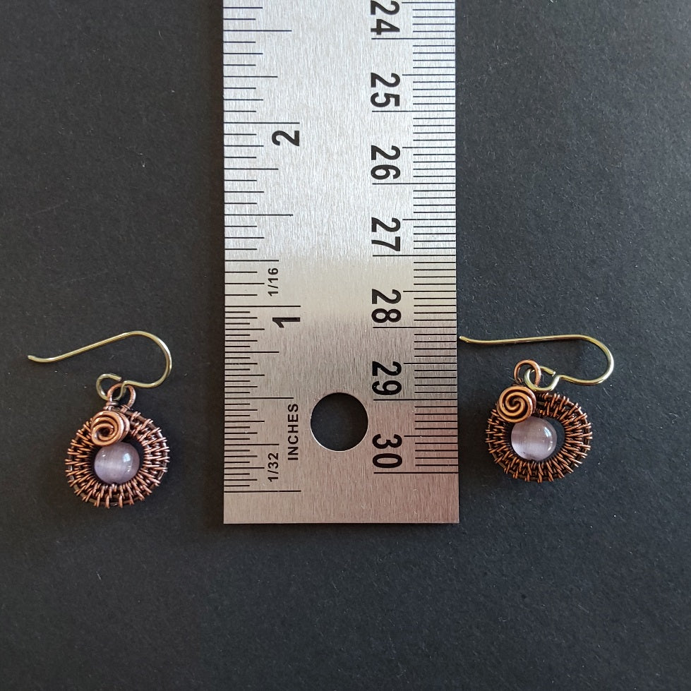 Mauve Cats Eye gemstone bead, copper wire weave non-tarnishing earrings with hypoallergenic ear wires. Earrings are 1/2 inch (1.5 cm) plus ear wire length of 2 cm.