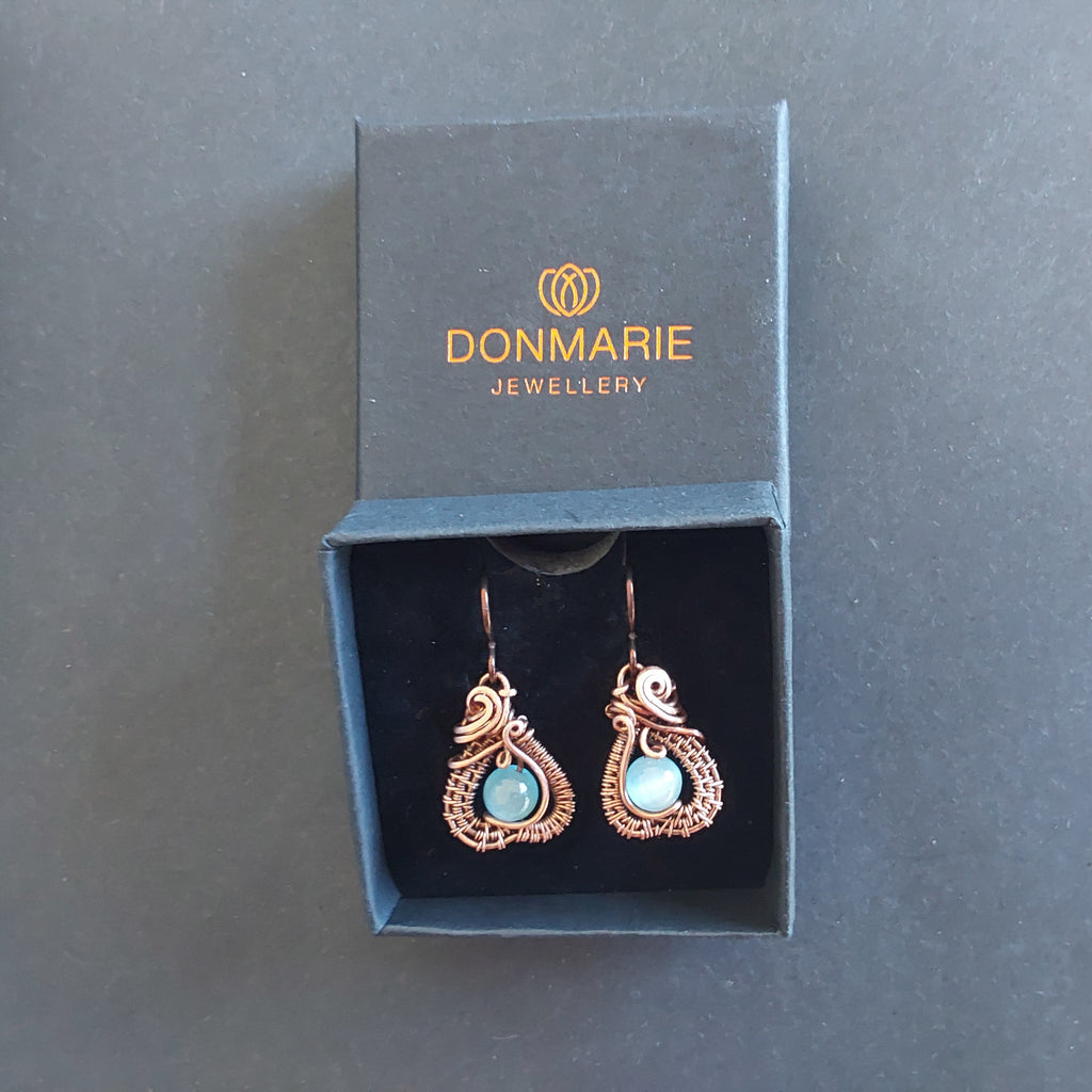 Intricate wire weave earrings with Blue Cats Eye beads