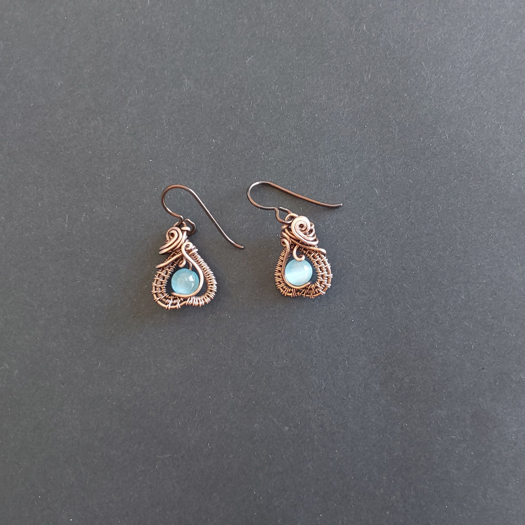 Intricate wire weave earrings with Blue Cats Eye beads