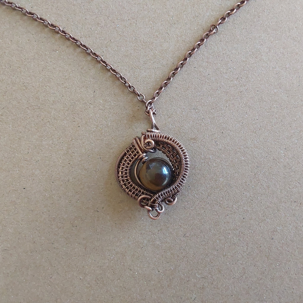Wire weave Tigers Eye pendant