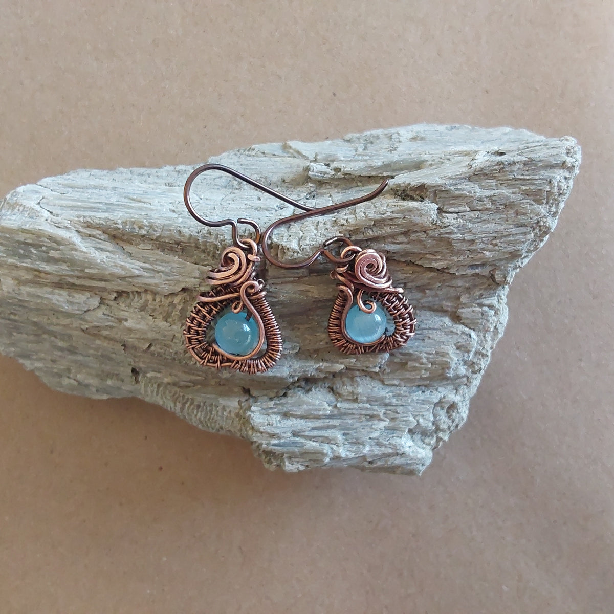 Intricate wire weave earrings with Blue Cats Eye beads