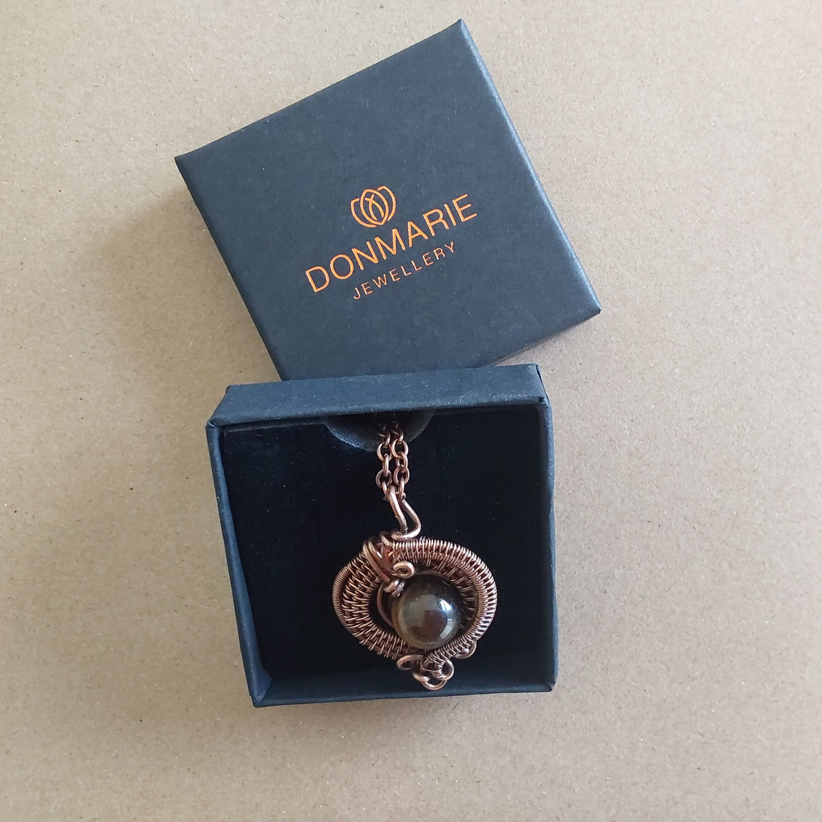 Wire weave Tigers Eye pendant