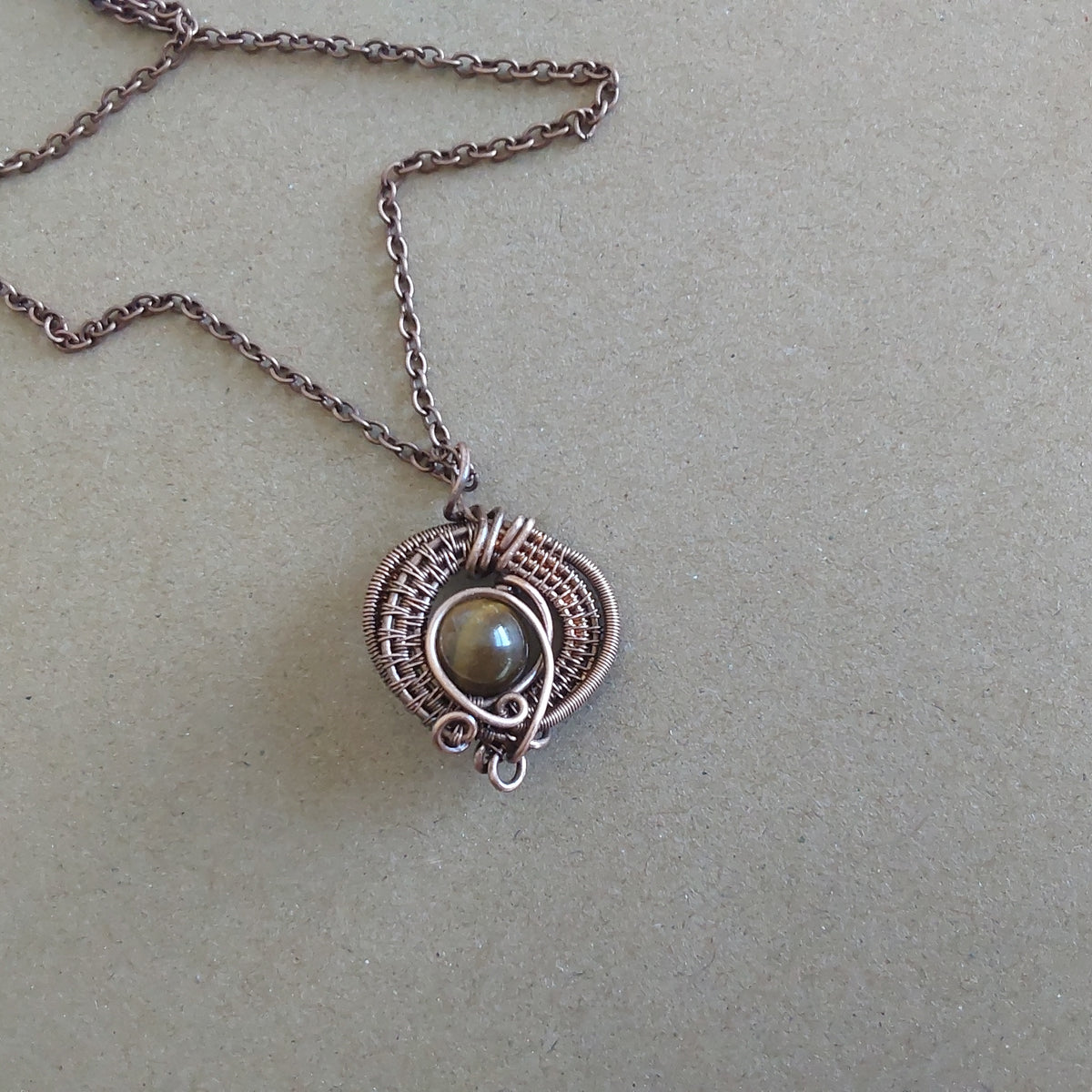 Wire weave Tigers Eye pendant